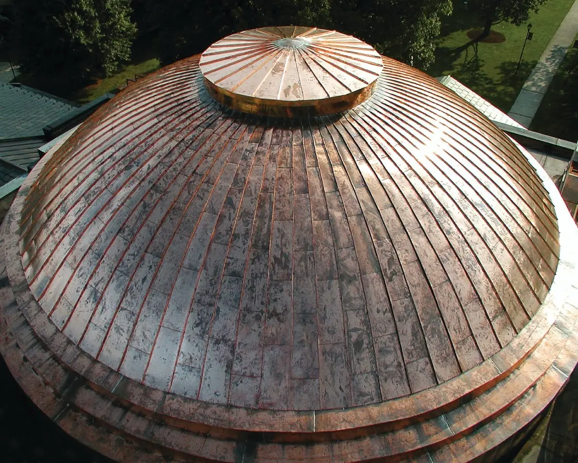 Craftsman Roofing crew installing a new roof in South Portland